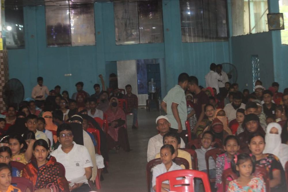 Indoor evening community welfare event