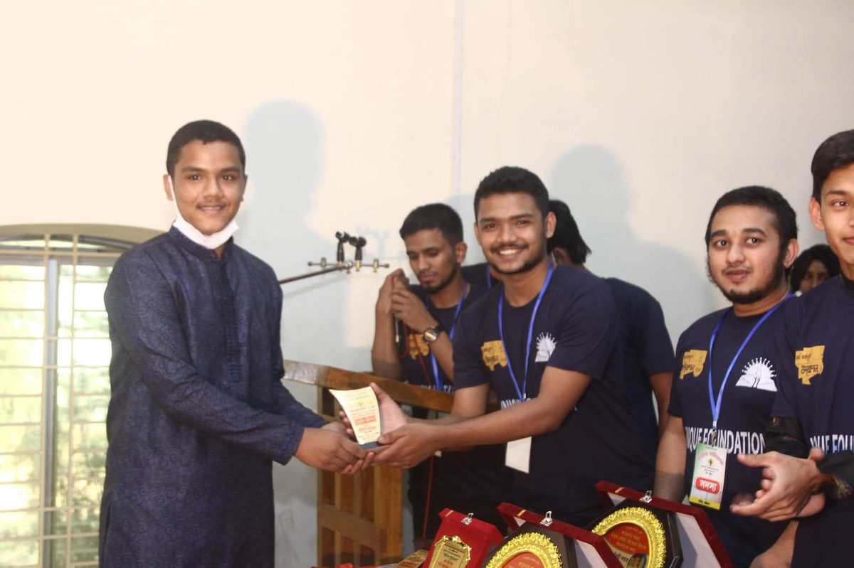 Student receiving award at scholarship ceremony